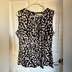 Calvin Klein sleeveless blouse.
